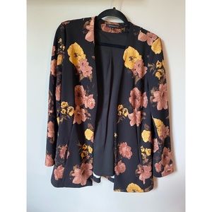 Floral collarless open front blazer. Dynamite. Size large.